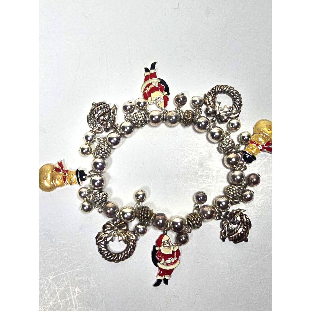 Avon Christmas Charm Bracelet Silver Tone Stretch Santa Snowman Wreath Jewelry